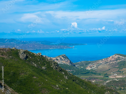 Impressive landscapes of Corsica. View of the mediterranean sea between the mountains. Near Saint Florent, Heau-Corse, France.