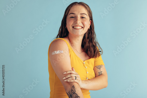 Woman looking happy after vaccination photo