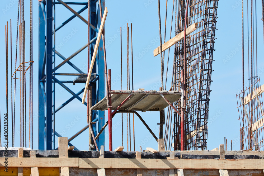 Real construction site on a high building.