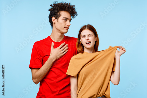 a guy and a girl in colorful t-shirts more fun studio modern style