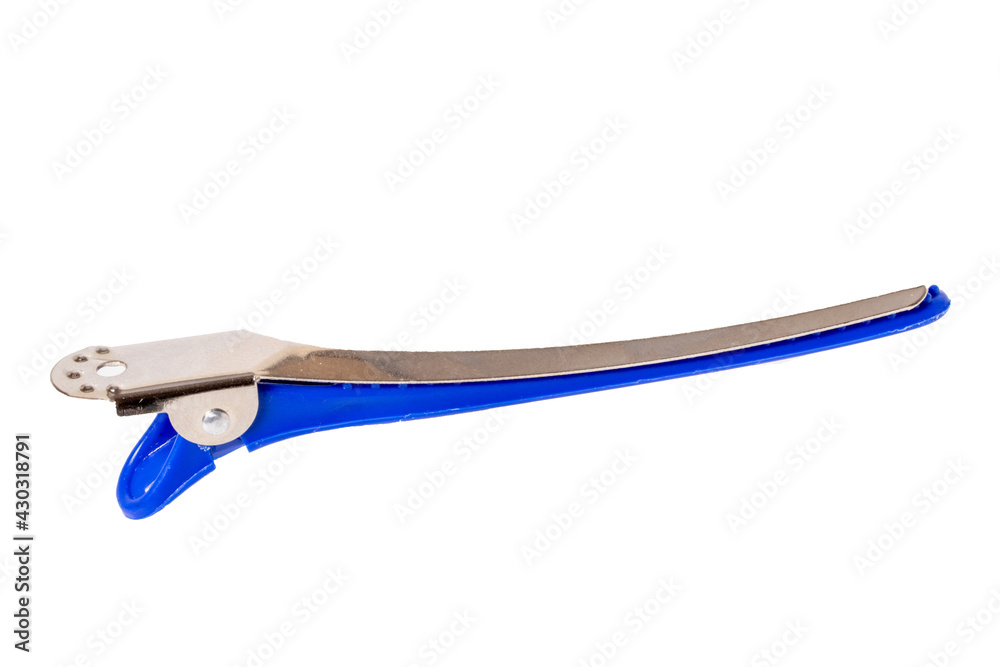 Hairdresser tools isolated. Close-up of blue hair-pin or hair clip isolated on a white background. Equipment of hair stylist. Macro photograph. Hairdresser tools isolated. Close-up of blue hair-pin or hair clip isolated on a white background. Equipment of hair stylist. Macro photograph.