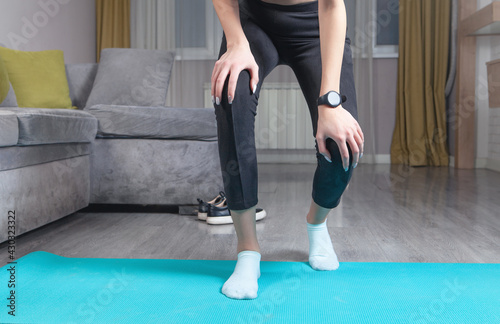 Young woman exercise in home. Healthy life