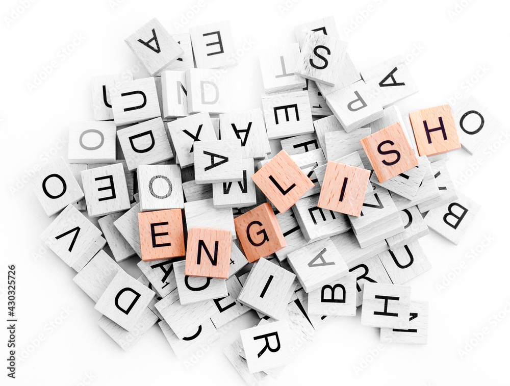 black and white wooden alphabet blocks and wooden word English on white background black and white wooden alphabet blocks and wooden word English on white background