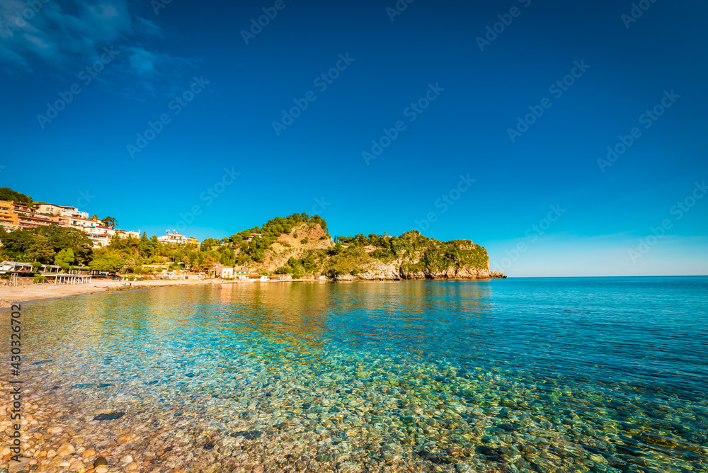 Turquoise water on the beach of Taormina, Sicily 