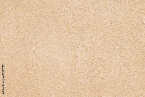 Texture of rough beige plaster. Architectural abstract background.