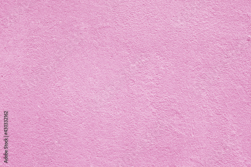 Texture of rough pink plaster. Architectural abstract background.