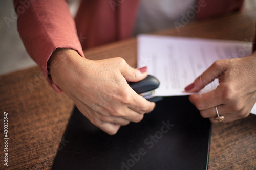 Business woman taking care of business document.