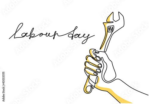 One continuous line drawing of the master's hand holds a wrench with lettering Labour Day isolated on white background. 1st may celebration. Auto service concept. Vector illustration