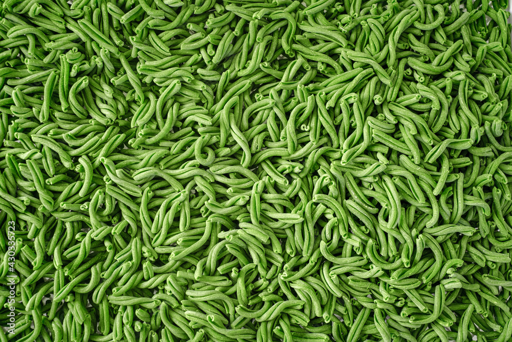 Fresh green casarecce pasta with spinach close-up. Dry pasta texture Fresh green casarecce pasta with spinach close-up. Dry pasta texture