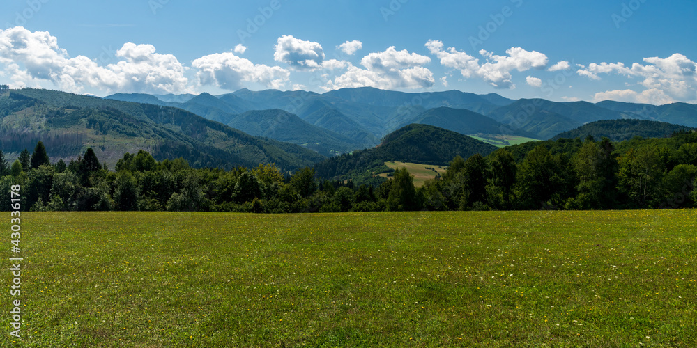 Mala Fatra and lower hills of Kysucka vrchovina mountains from meadow bellow Zlien hill near Lutise in Slovakia
