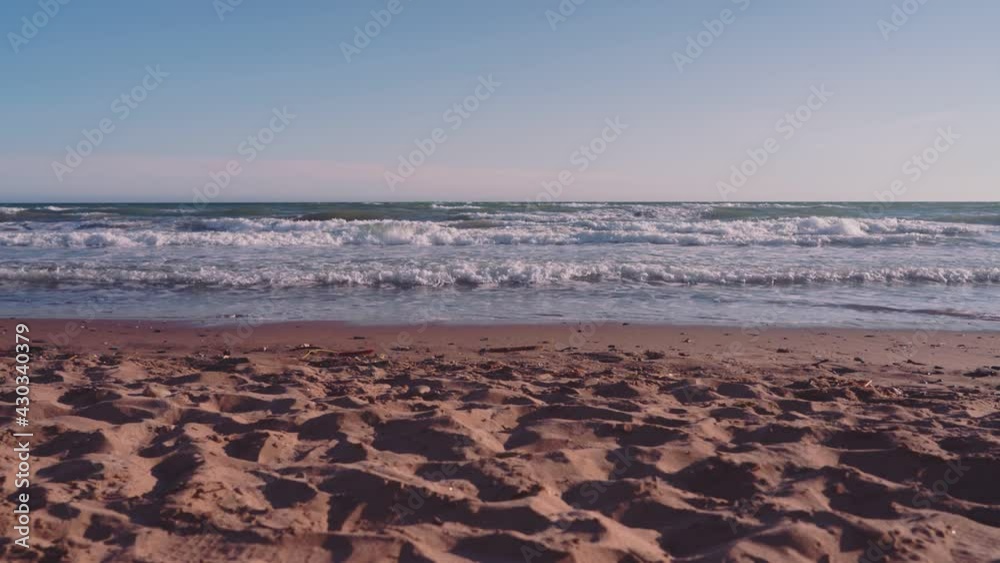 Waves in slow motion at an empty beach Waves in slow motion at an empty beach