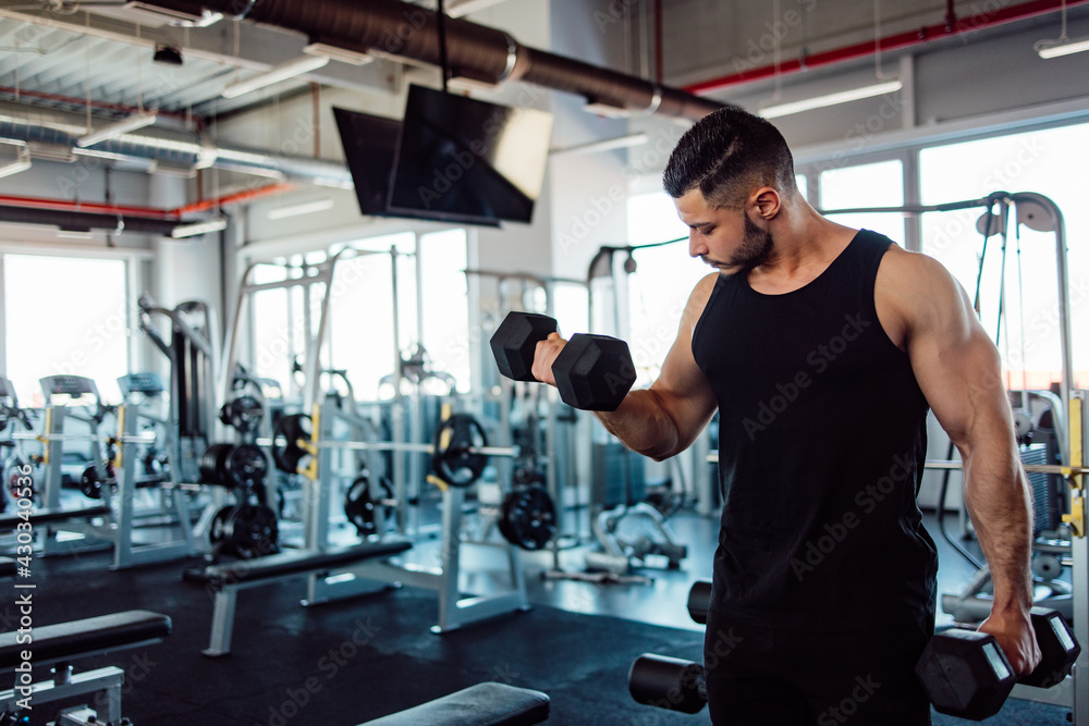 Male doing workout indoor. Male doing workout indoor.