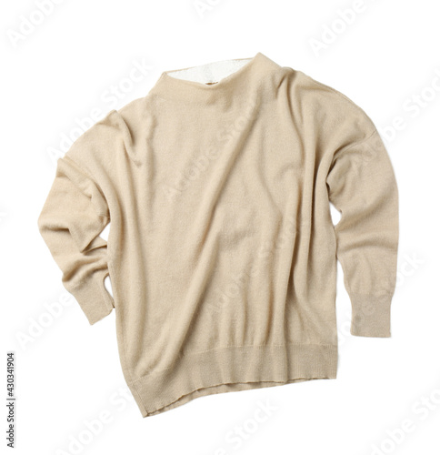 Cashmere sweater on white background, top view