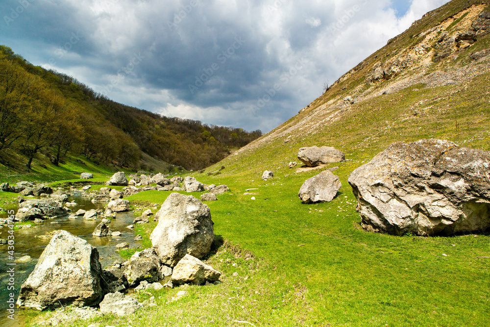 Beautiful rural landscape in Europe, Amazing nature in spring. landscape with green grass field and blue sky with clouds with curved horizon line. Beautiful rural landscape in Europe, Amazing nature in spring. landscape with green grass field and blue sky with clouds with curved horizon line.