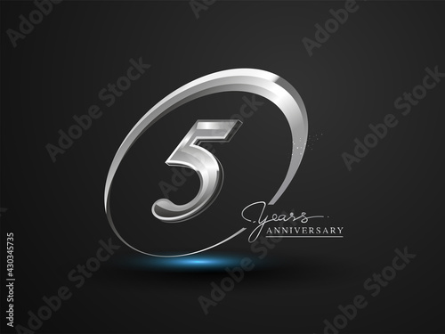 5 Years Anniversary Celebration. Anniversary logo with ring and elegance silver color isolated on black background, vector design for celebration, invitation card, and greeting card