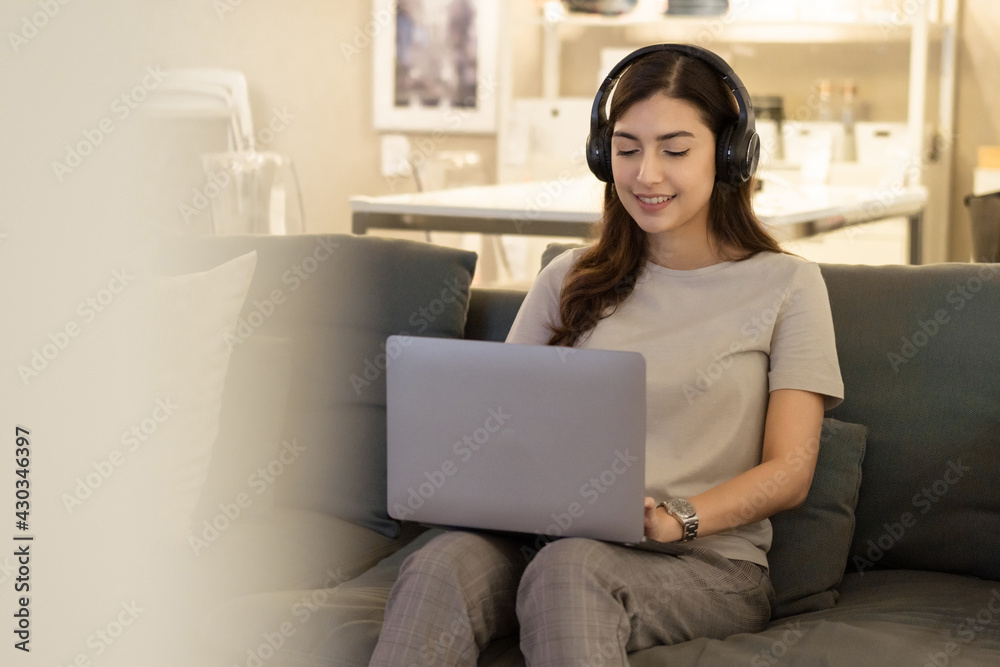 Female operator working overtime using laptop and talking with customer. meeting video conference with client. support or call center service Female operator working overtime using laptop and talking with customer. meeting video conference with client. support or call center service