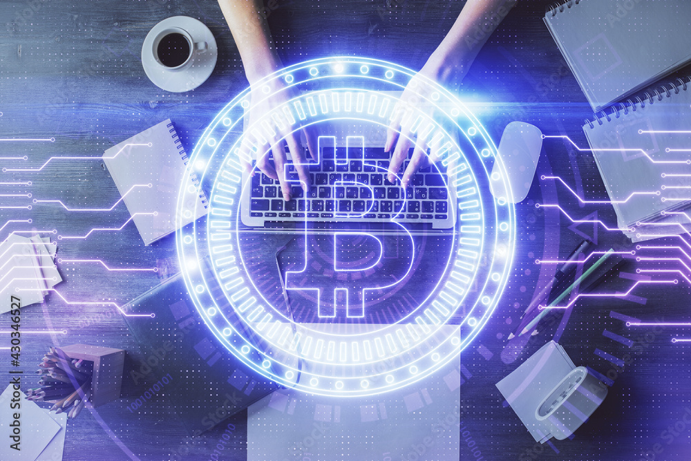 Double exposure of woman hands working on computer and blockchain theme hologram drawing. Top View. bitcoin cryptocurrency concept. Double exposure of woman hands working on computer and blockchain theme hologram drawing. Top View. bitcoin cryptocurrency concept.