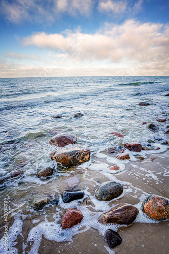 Fototapeta Naklejka Na Ścianę i Meble -  Baltic sea and sky. Big stone in the water - stormy weather.