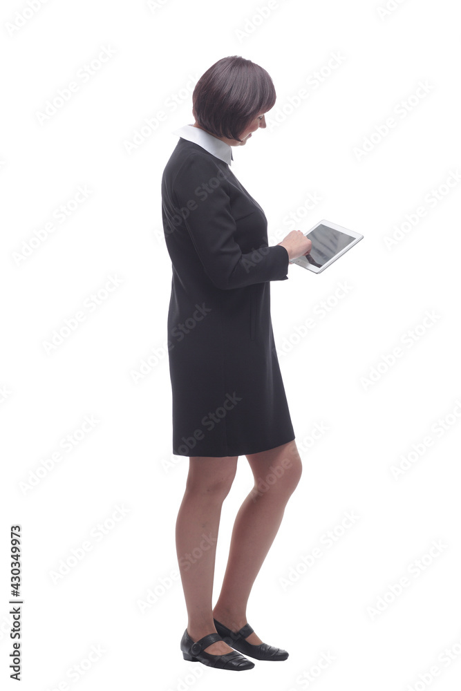 side view. young business woman using a digital tablet . side view. young business woman using a digital tablet .