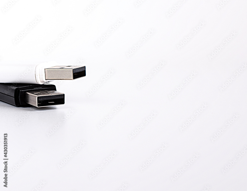 Two USB drives on a light background. Copy space. Two USB drives on a light background. Copy space.