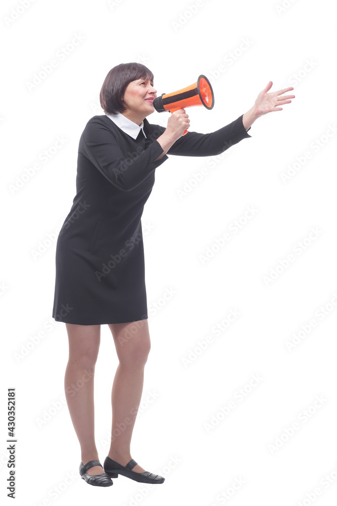 young business woman shouts through a megaphone. young business woman shouts through a megaphone.