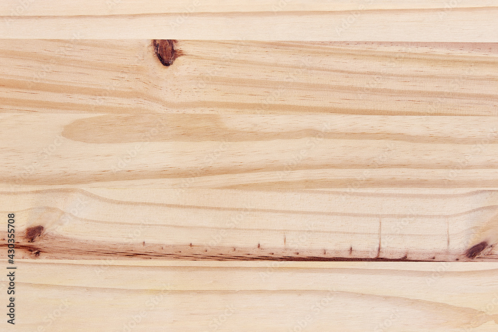Fototapeta premium Closeup of light wooden texture background with natural pattern.