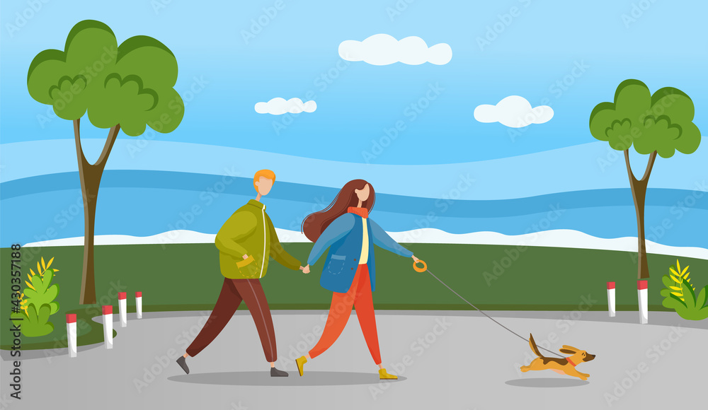 Fototapeta premium Couple in relationship walking in forest with their pet. Young guy and girl holding hands walking in garden, romantic walk. Lovers man and woman on date outdoor. Happy promenade of owners with dog