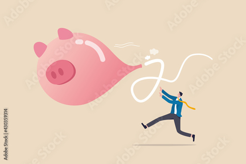 Loss money from economic crisis or stock market crash, financial problem or losing all savings pension concept, businessman running trying to catch flying deflate piggy bank balloon.