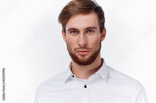 handsome blond man in white shirt confident look white shirt gesturing with his hands