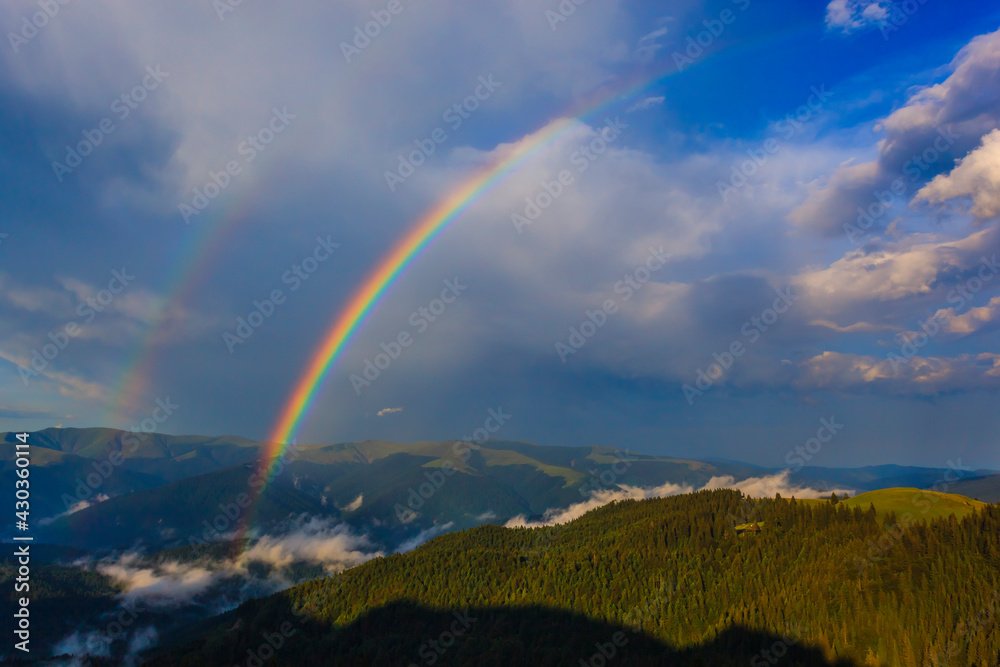 Rainbow over the mountains, Bucegi Mountains, Romania, Prahova County Rainbow over the mountains, Bucegi Mountains, Romania, Prahova County