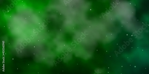 Dark Green vector background with small and big stars. © Guskova