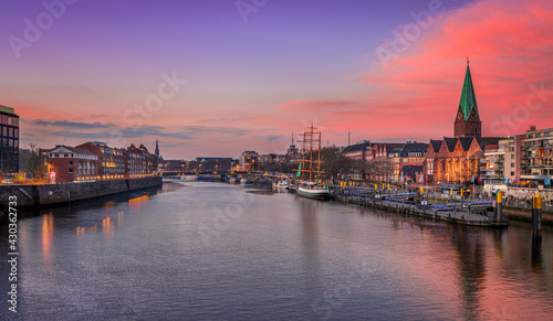 Sunset at the Weser river in the old town of Bremen, Germany photo