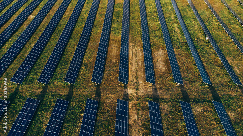 Obraz premium Solar panels in aerial view. Solar panels system power generators from sun