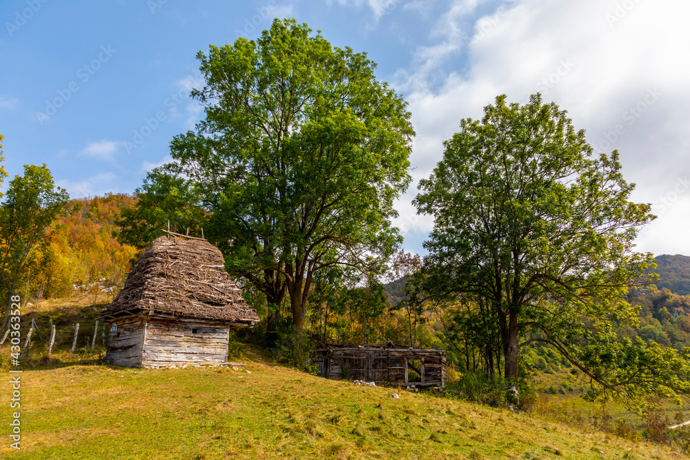 Traditional wooden house in Apuseni Mountains in Transylvania, Romania. The place is known as Traditional wooden house in Apuseni Mountains in Transylvania, Romania. The place is known as