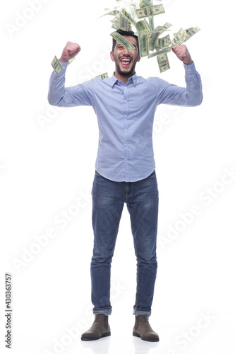 in full growth. cheerful man with banknotes .