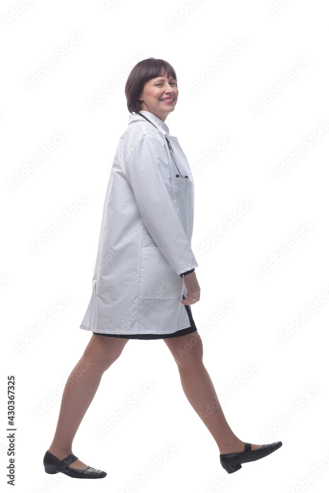 confident female paramedic striding forward. isolated on a white background. confident female paramedic striding forward. isolated on a white background.