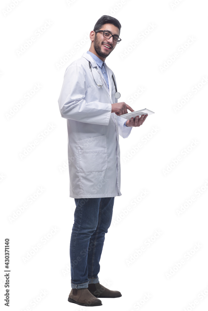 male doctor using a digital tablet. isolated on a white background. male doctor using a digital tablet. isolated on a white background.