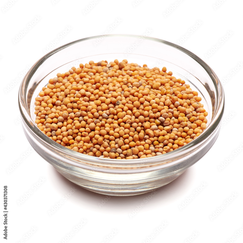 Glass bowl with mustard seeds isolated on white backdrop with clipping path embedded Glass bowl with mustard seeds isolated on white backdrop with clipping path embedded