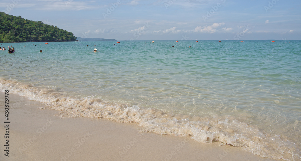  Sai Kaew Beach Sattahip-Military Beach.People sunbathe and swim.Waves roll on the sand