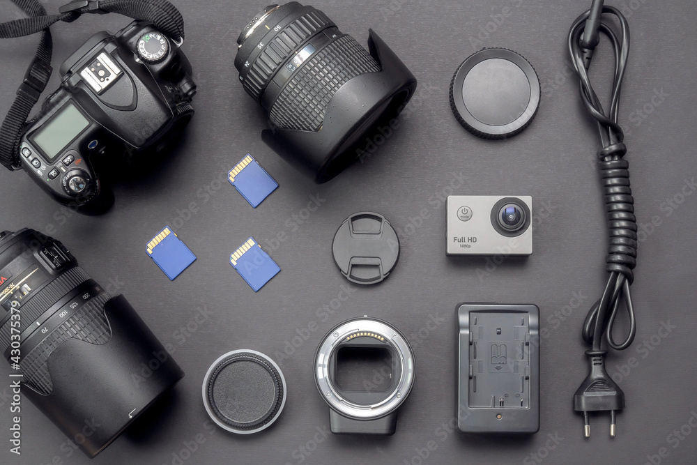 Set of photo equipment on a black background. Set of photo equipment on a black background.
