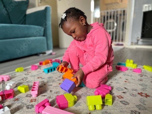 baby playing with blocks