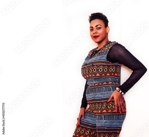 young pretty african american woman happy smiling posing against white background, lifestyle people concept