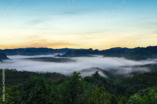 Beautiful views of mountains in the mist at sunrise time, Ranong