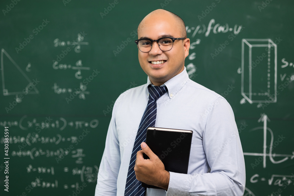 Young asian teacher man teaching video conference with student. Male Indian teacher training the mathematics in classroom from online course.