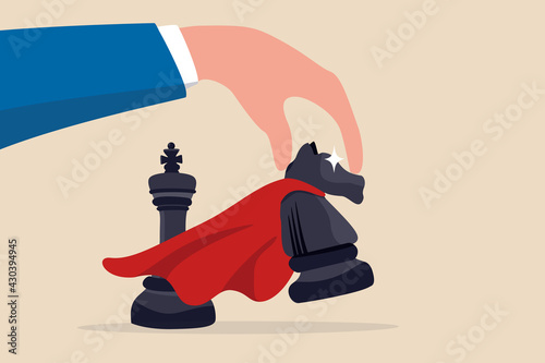 Winning strategy or victory move in business competition, success tactic or smart move concept, strategic businessman hand holding superpower knight chess piece to move to winning turn.