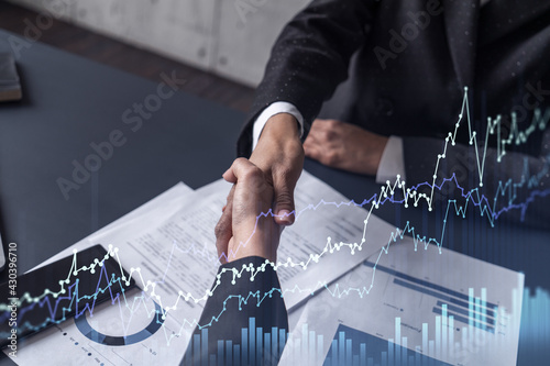 Fotografie A handshake symbolize a capital market transaction to proceed profit in stock trading