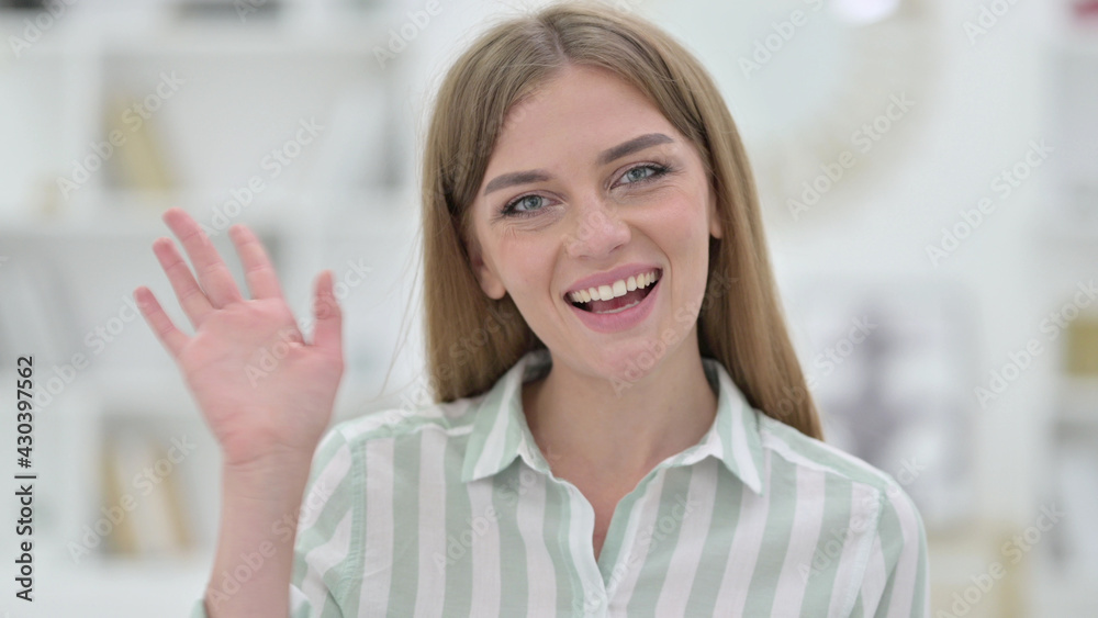 Portrait of Beautiful Young Woman doing Video Chat