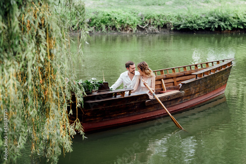 a boat trip for a guy and a girl along the canals and bays of the river