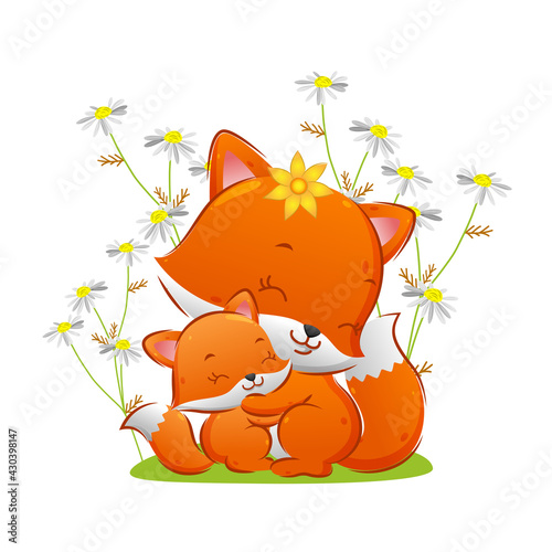The baby fox is giving the hug to her mother in the flowers park