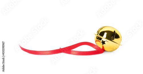 Shiny golden sleigh bell with ribbon isolated on white